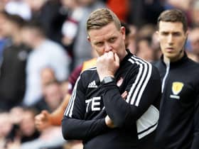 Barry Robson lamented the decision not to check a potential penalty for a challenge on Marley Watkins.