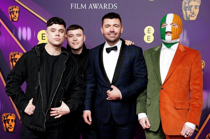 Mo Chara (Naoise O Caireallain), Moglai Bap (Liam Og O Hannaidh), Rich Peppiatt and DJ Provai of Kneecap attending the 78th British Academy Film Awards