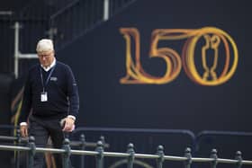 Martin Slumbers, the R&A chief executive, walks from the front of the R&A Clubhouse during the final round of the 150th Open. Picture: Tom Russo.