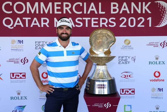 Antoine Rozner of France poses with the trophy aftet his victory in the Commercial Bank Qatar Masters at Education City Golf Club in Doha. Picture: Richard Heathcote/Getty Images.