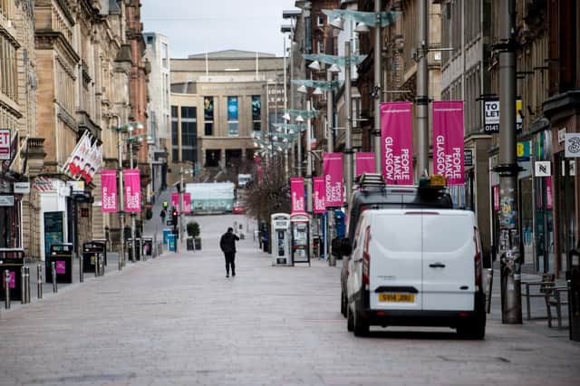 A virtually empty Buchanan Street in Glasgow as people observe the lockdown. Picture: John Devlin