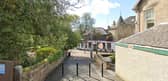 The two were found dead in a property on Station Road, Milngavie (Photo: Google Maps).