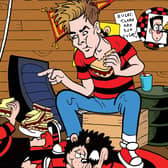 Joe Sugg with Dennis the Menace as the YouTuber and former Strictly Come Dancing star guest-edits a special Beano comic to celebrate 70 years of one of its best-loved characters (Image: Beano Studios)