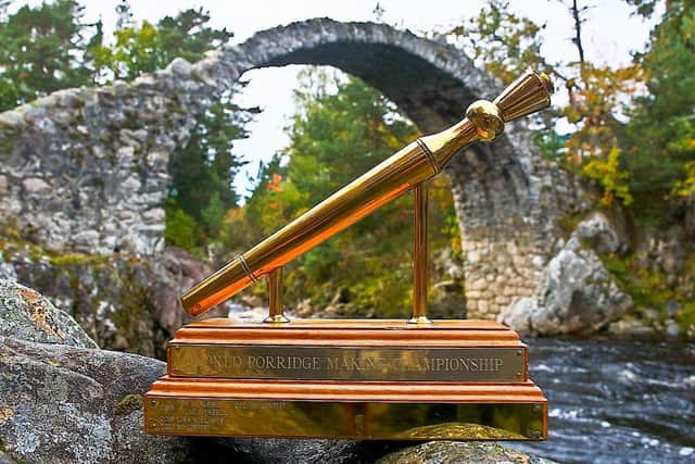 The world famous Golden Spurtle with Carrbridge Pack Horse bridge behind. Pic: James Ross
