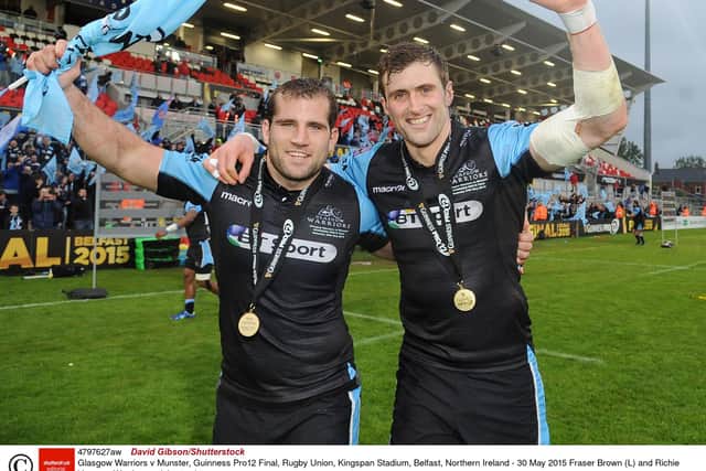 Fraser Brown, left, celebrates with Richie Vernon after Glasgow Warriors' victory over Munster in the Guinness Pro12 final at Kingspan Stadium, Belfast, in 2015. (Photo by Fotosport/David Gibson/Shutterstock)
