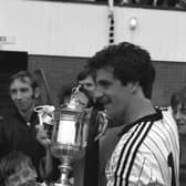 St Mirren's Fitzpatrick celebrates with the Scottish Cup in 1987.