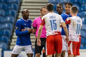 Rangers' Glen Kamara takes exception to something said by Slavia's Ondrej Kudela during the Europa League match at Ibrox on March 18 (Photo by Alan Harvey / SNS Group)