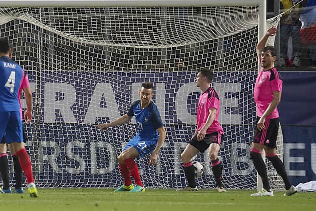 France's Laurent Koscielny celebrates scoring for France against Scotland in Metz in 2016.