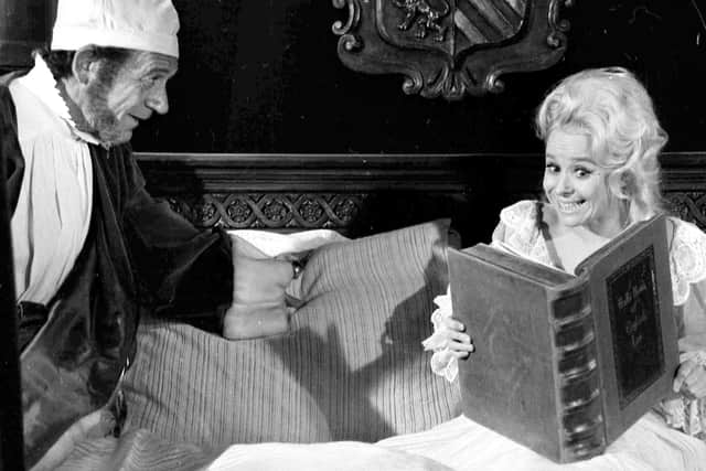 Barbara Windsor and Sid James in Carry On Henry