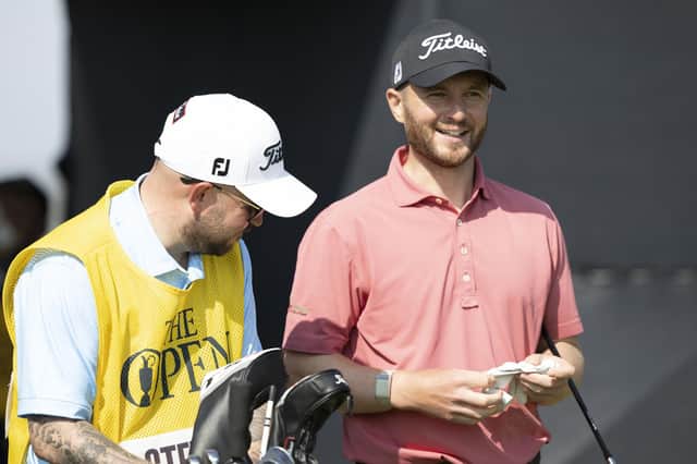 Michael Stewart chats with his caddie during the opening round of the 151st Open at Royal Liverpool. Picture: Tom Russo/The Scotsman.