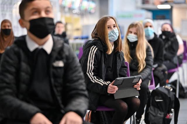 Instead of ‘how was school?’, parents should ask what their children learned that day (Picture: Jeff J Mitchell/Getty Images)