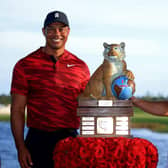 Tournament host Tiger Woods poses with Viktor Hovland after the Norwegian's win in the Hero World Challenge at Albany Golf Course in the Bahamas. Picture: Mike Ehrmann/Getty Images.