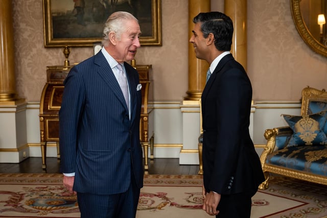 King Charles III welcomes Rishi Sunak during an audience at Buckingham Palace, London, where he invited the newly elected leader of the Conservative Party to become Prime Minister and form a new government.