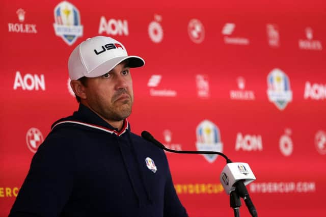 A stern-faced Brooks Koepka speaks to the media prior to the 43rd Ryder Cup at Whistling Straits. Picture: Stacy Revere/Getty Images.
