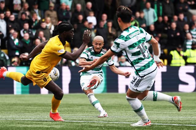 Daizen Maeda scores Celtic's third goal in the win over Livingston. (Photo by Ross MacDonald / SNS Group)