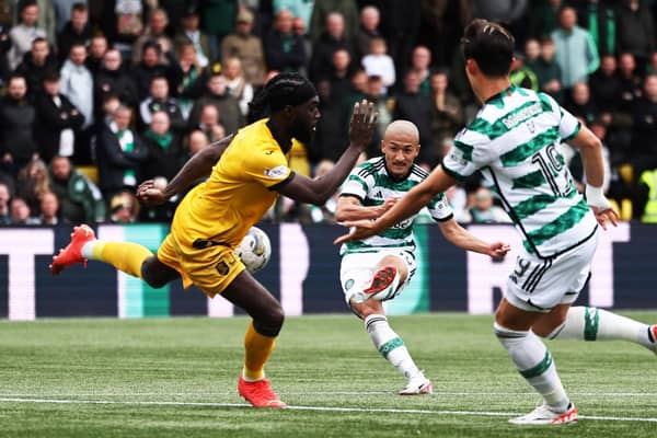 Daizen Maeda scores Celtic's third goal in the win over Livingston. (Photo by Ross MacDonald / SNS Group)