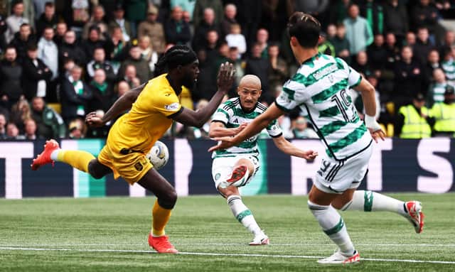 Daizen Maeda scores Celtic's third goal in the win over Livingston. (Photo by Ross MacDonald / SNS Group)