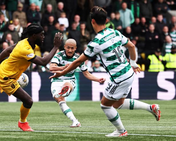 Daizen Maeda scores Celtic's third goal in the win over Livingston. (Photo by Ross MacDonald / SNS Group)