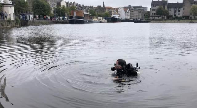 Edinburgh diver reunites astonished owner with phone she dropped in the Water of Leith over a year ago
