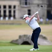Bob MacIntyre tees off on 18 before finishing his first round at St Andrews Old Course with a birdie. (Photo by Ross Parker / SNS Group)