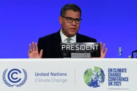 Britain's President for COP26 Alok Sharma gestures during the final stages of the COP26 UN Climate Change Conference in Glasgow