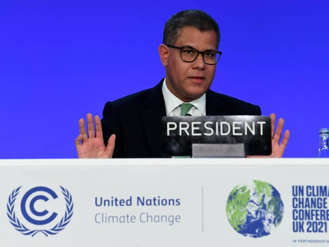 Britain's President for COP26 Alok Sharma gestures during the final stages of the COP26 UN Climate Change Conference in Glasgow