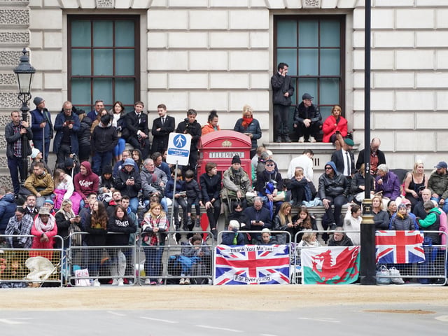 Members of the public line the streets ahead of the State Funeral of Queen Elizabeth II, held at Westminster Abbey, London. Picture date: Monday September 19, 2022.