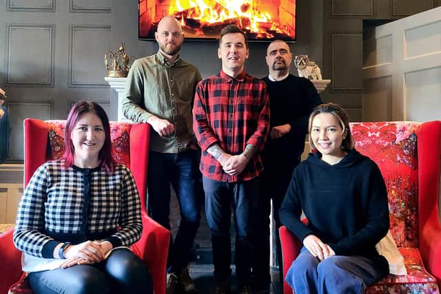 From left: Sean Anderton, Scott Durbin, and Stuart Bell standing, with Caitlin Whyte and Christina Cheung at the front. Picture: contributed.