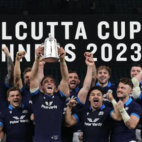 Scotland's flanker Jamie Ritchie lifts the Calcutta Cup after the 29-23 win over England at Twickenham.