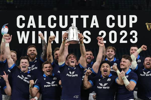 Scotland's flanker Jamie Ritchie lifts the Calcutta Cup after the 29-23 win over England at Twickenham.