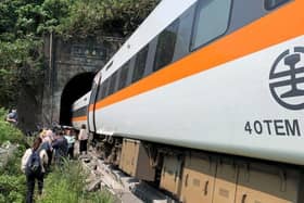 At least 36 people have been killed with many more injured after a train in Taiwan derailed inside a tunnel. Photo by HANDOUT/Central Emergency Operation Cent/AFP via Getty Images)