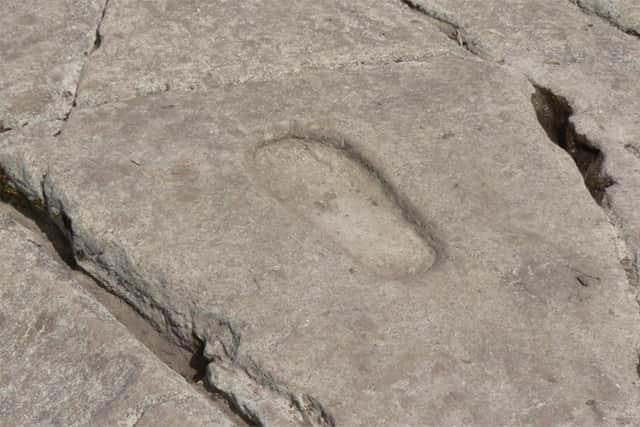 The footprint at Dunadd fort in Argyll, the power base of Gaelic kings more than 1,500 years ago.