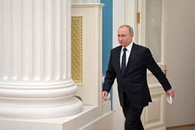 Russian President Vladimir Putin chairs a meeting of big businesses at the Kremlin in Moscow on February 24th. Putin said on Thursday that his country wanted to remain part of the world economy and had no plans to harm it. Photo: ALEXEY NIKOLSKY/SPUTNIK/AFP via Getty Images.