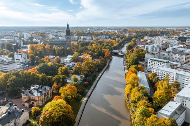 In the warm summer months, visitors are drawn to Turku's Aura River where there are cafes and restaurants in elegant stone buildings, riverside pavilions and on ships. Pic: Contributed