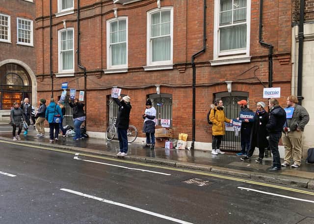 US Democratic Party members queue outside the Abbey Centre in central London in March last year to vote for their party's presidential election candidate, a contest won by the now President-elect Joe Biden (Picture: Lewis McKenzie/PA Wire