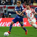 Rangers star Borna Barisic in action for Croatia during their World Cup quarter-final win over Japan. (Photo by JEWEL SAMAD/AFP via Getty Images)