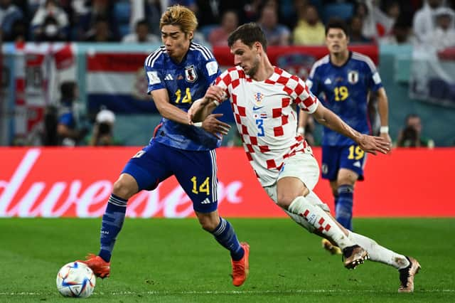 Rangers star Borna Barisic in action for Croatia during their World Cup quarter-final win over Japan. (Photo by JEWEL SAMAD/AFP via Getty Images)