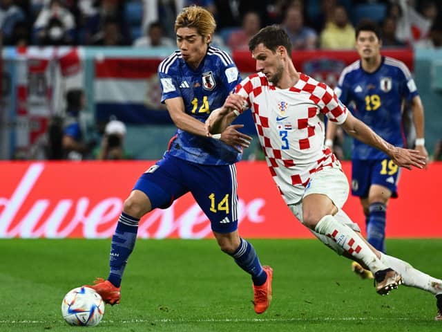 Rangers star Borna Barisic in action for Croatia during their World Cup quarter-final win over Japan. (Photo by JEWEL SAMAD/AFP via Getty Images)