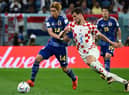 Rangers star Borna Barisic in action for Croatia during their World Cup quarter-final win over Japan. (Photo by JEWEL SAMAD/AFP via Getty Images)