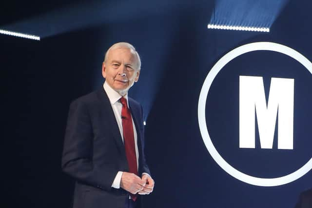 Mastermind winner Jonathan Gibson, the youngest ever at age 24, with host John Humphrys