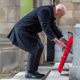 First Minister John Swinney lays a wreath during the Remembrance Sunday ceremony at the Stone of Remembrance outside the City Chambers in Edinburgh. (Picture: Jane Barlow/PA Wire)