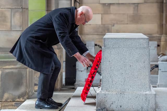 First Minister John Swinney lays a wreath during the Remembrance Sunday ceremony at the Stone of Remembrance outside the City Chambers in Edinburgh. (Picture: Jane Barlow/PA Wire)
