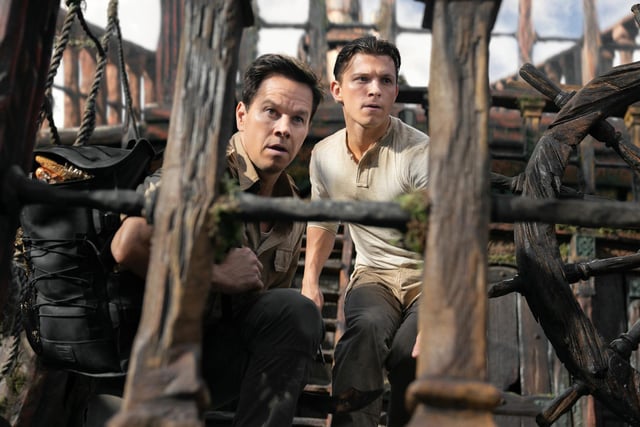 Mark Wahlberg as Victor Sullivan and Tom Holland as Nathan Drake. Uncharted, the film based off the hit video game series was the third most searched for film.