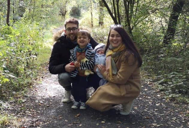 Andrew Still and Sara with baby Eliza and their second child.