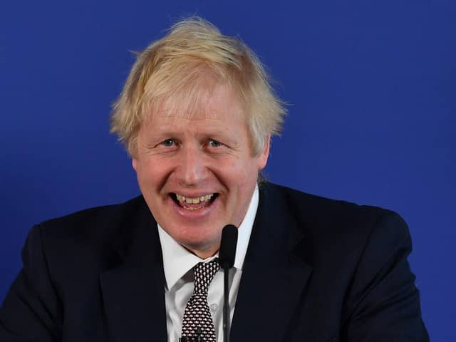 Boris Johnson laughing in 2019, but has the Sue Gray report wiped the smile off his face? (Picture: Ben Stansall/AFP via Getty Images)