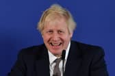 Boris Johnson laughing in 2019, but has the Sue Gray report wiped the smile off his face? (Picture: Ben Stansall/AFP via Getty Images)