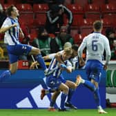 Kilmarnock's David Watson (centre) celebrates after scoring an injury-time winner against Aberdeen at Pittodrie. (Photo by Ross MacDonald / SNS Group)