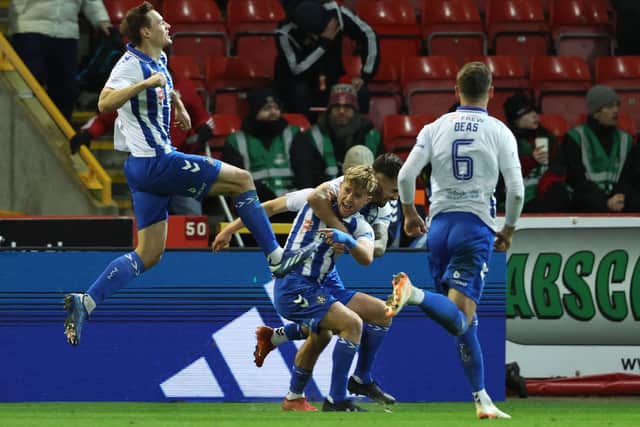 Kilmarnock's David Watson (centre) celebrates after scoring an injury-time winner against Aberdeen at Pittodrie. (Photo by Ross MacDonald / SNS Group)