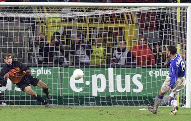Giovanni van Bronckhorst's penalty is saved by Borussia Dortmund goalkeeper Jens Lehmann as Rangers lose out in the UEFA Cup third round tie between the teams in 1999. (Photo by SNS Group).
