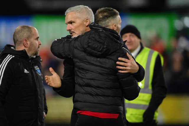 Aberdeen manager Jim Goodwin and Darvel manager Mick Kennedy at full time after the Scottish Cup tie. (Photo by Ross MacDonald / SNS Group)